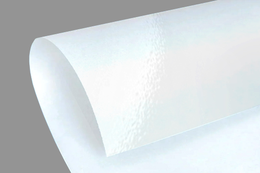 Postcard with raised spot UV coating on front side highlighting key design elements